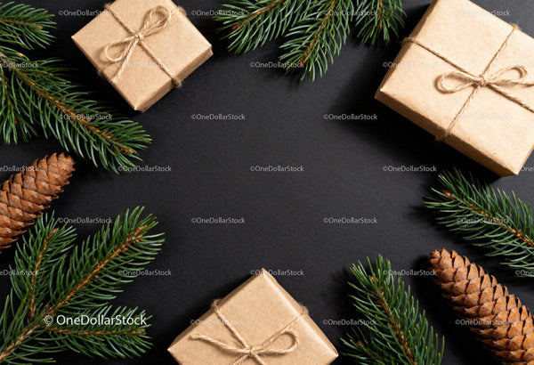 Rustic Christmas gifts with pinecones and spruce branches