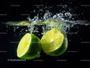 Fresh Lime Slices Splash in Water for Refreshing Fruit Drink