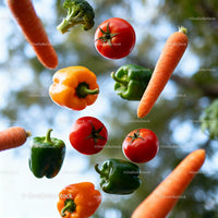 Fresh colorful vegetables floating against blue sky