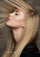 Blonde woman with sleek hair and closed eyes in profile