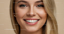 Close up of smiling young woman with healthy teeth