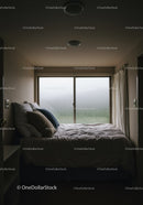 Cozy Bedroom with Rainy Window and Soft Lighting