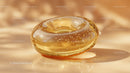 Luxurious Golden Glass Gemstone with Sparkling Glitter in Sunlight