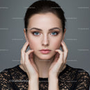 Elegant Portrait of a Young Woman with Blue Eyes and Clear Skin