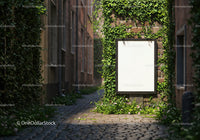 Blank billboard on ivy-covered brick wall in alley