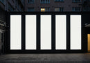 Five Large Vertical Blank Billboards on Urban Wall