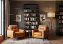 Cozy reading nook with leather armchairs and bookcase