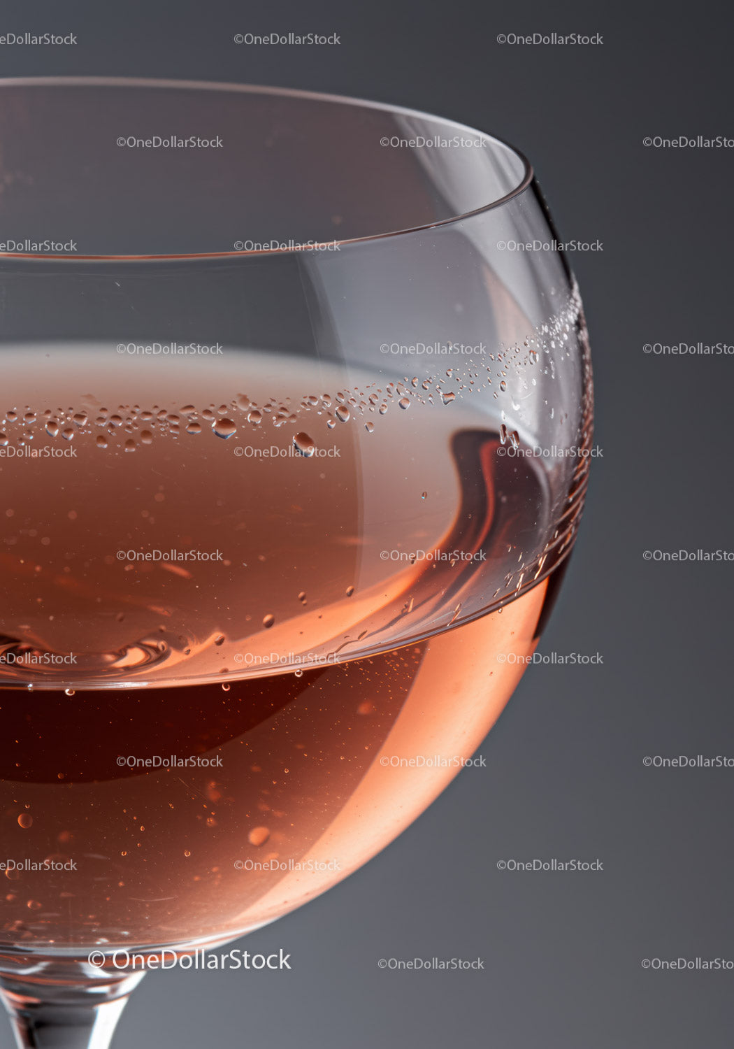 Close up of sparkling rosé wine in glass