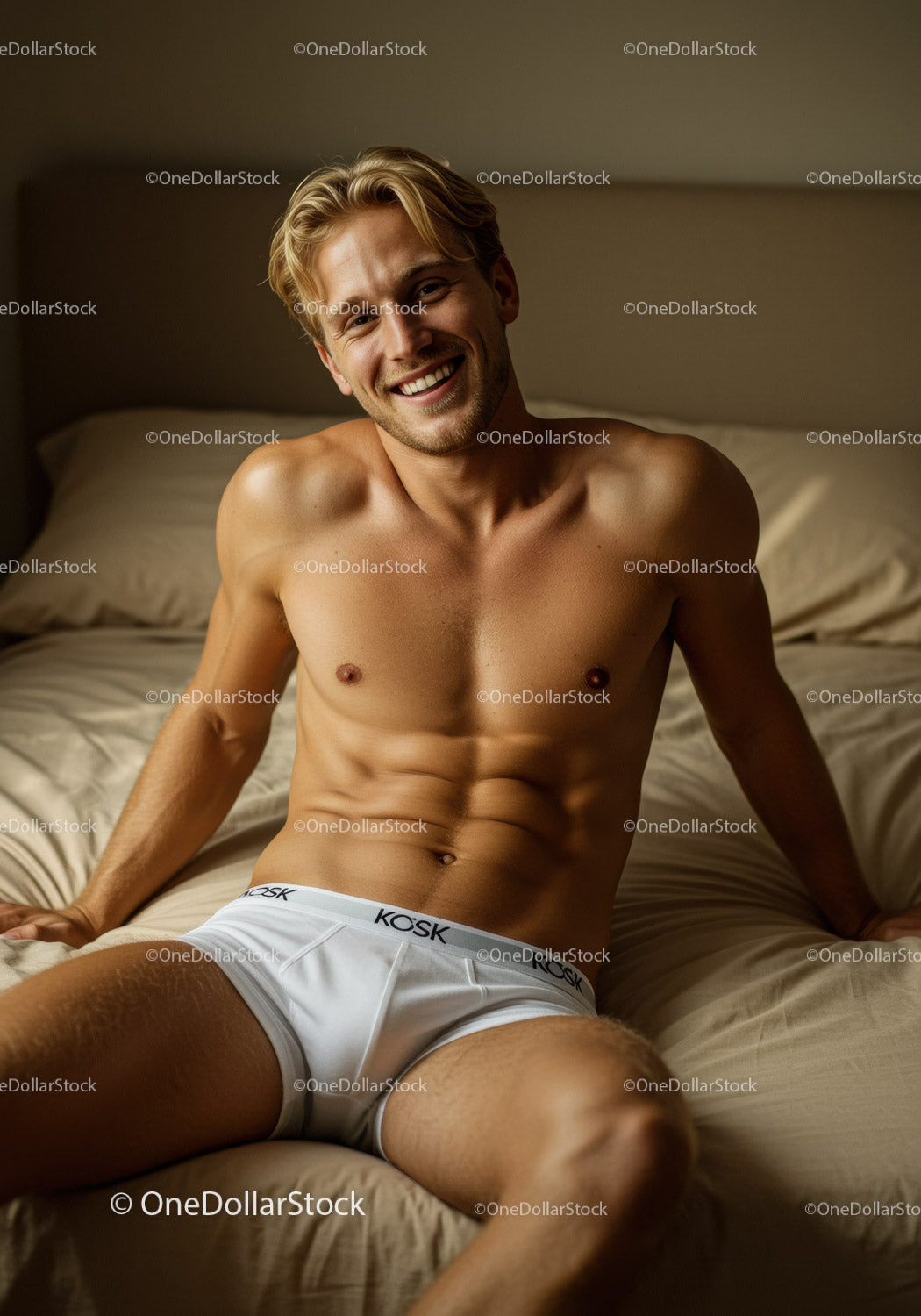 Smiling man relaxing on bed in white underwear