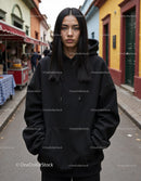 Fashionable Woman Wearing Black Hoodie in Urban City Street