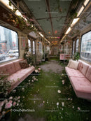 Overgrown Vintage Tram Interior with Pink Velvet Seats and Flowers