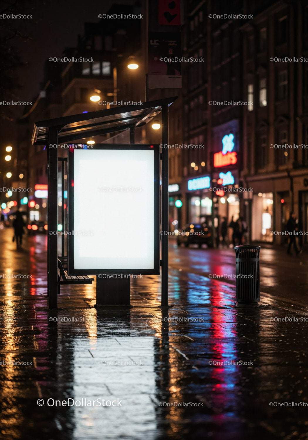 Urban Night Scene with Illuminated Bus Stop Shelter and Neon Lights