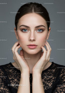Elegant Young Woman with Blue Eyes and Flawless Skin Portrait