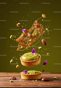 Pistachio tart with caramel decoration and petals