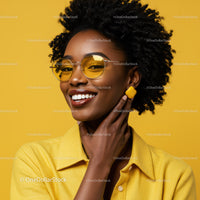 Vibrant Fashionable Woman with Yellow Accessories and Afro Hairstyle
