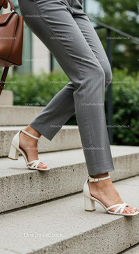 Elegant Woman Walking in Stylish High Heels and Gray Pants