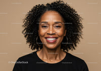Joyful African American Woman with Curly Hair and Bright Smile