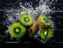Fresh Kiwi Slices Splashing in Water with Vibrant Green Colors