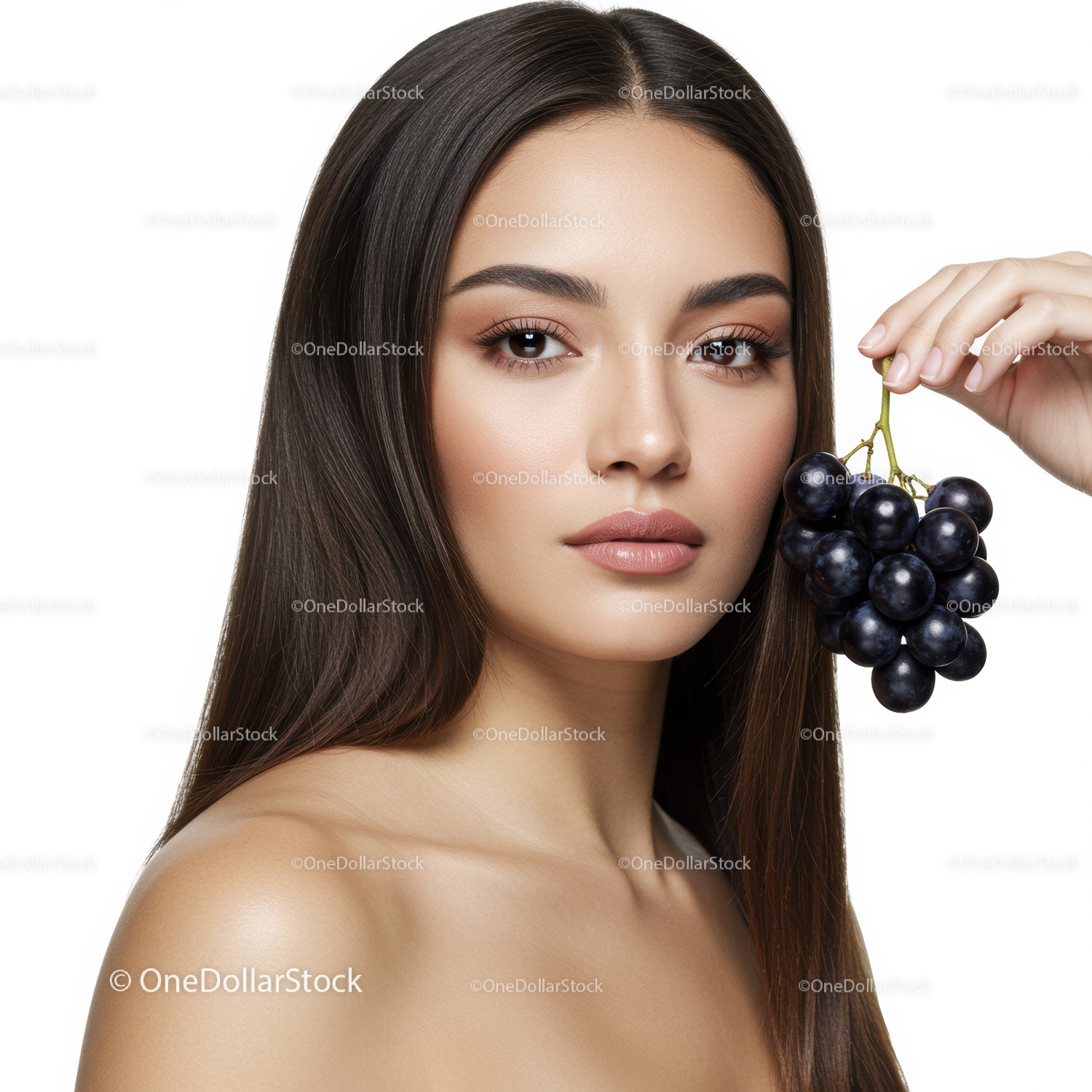Portrait of a Young Woman Holding Black Grapes with Natural Beauty