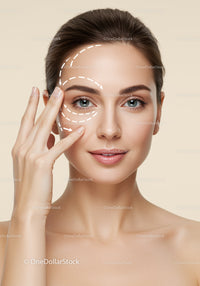 Young Woman Performing Facial Skincare Treatment with Clear Skin and Beautiful Expression