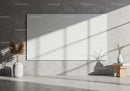Minimalist interior with blank canvas and natural light