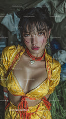 Stylish Young Woman in Yellow Floral Outfit with Wet Hair Outdoors
