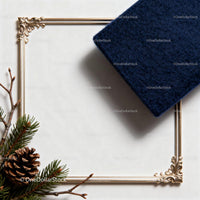 Elegant gold frame with winter pine and navy wool scarf
