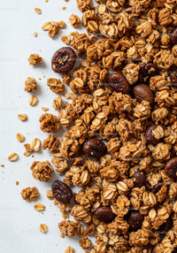 Crunchy granola mix with roasted coffee beans close up