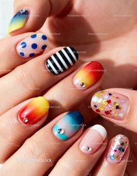 Colorful creative manicure with mixed nail art designs
