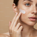 Close-Up of Woman Applying Moisturizer with Glowing Skin