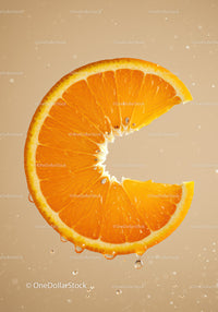Fresh orange slice dripping with juice on beige background