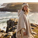 Woman in Cozy Beige Cape and Knit Headband Outdoors