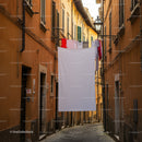 Narrow alley with clothes hanging between old buildings