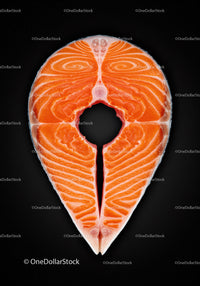 Fresh Salmon Steak Displayed on Black Surface