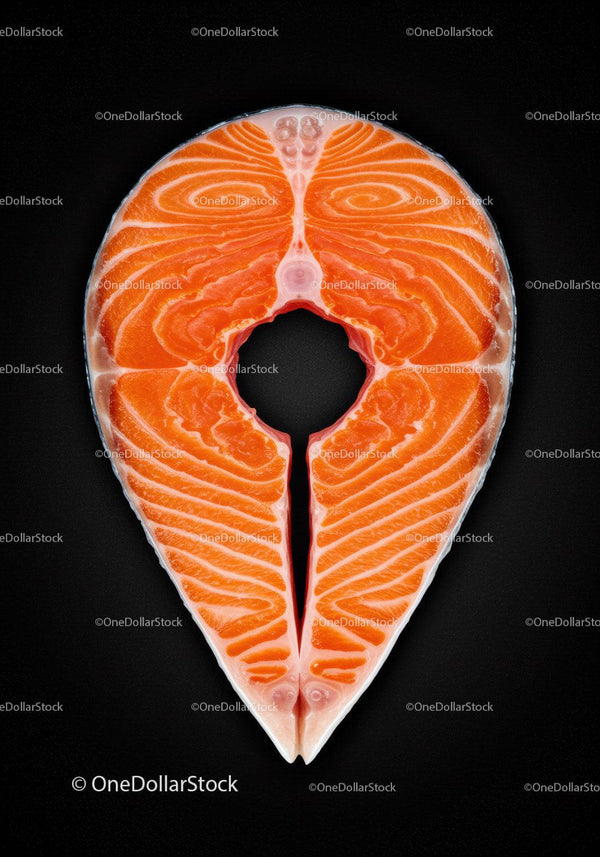 Fresh Salmon Steak Displayed on Black Surface