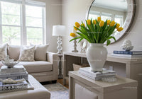 Bright Contemporary Living Room with Yellow Tulips and Soft Decor