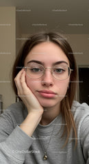 Casual young woman with glasses in relaxed setting