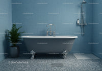Classic freestanding bathtub in serene blue bathroom