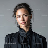Elegant Woman Portrait with Stylish Earrings and Black Blouse