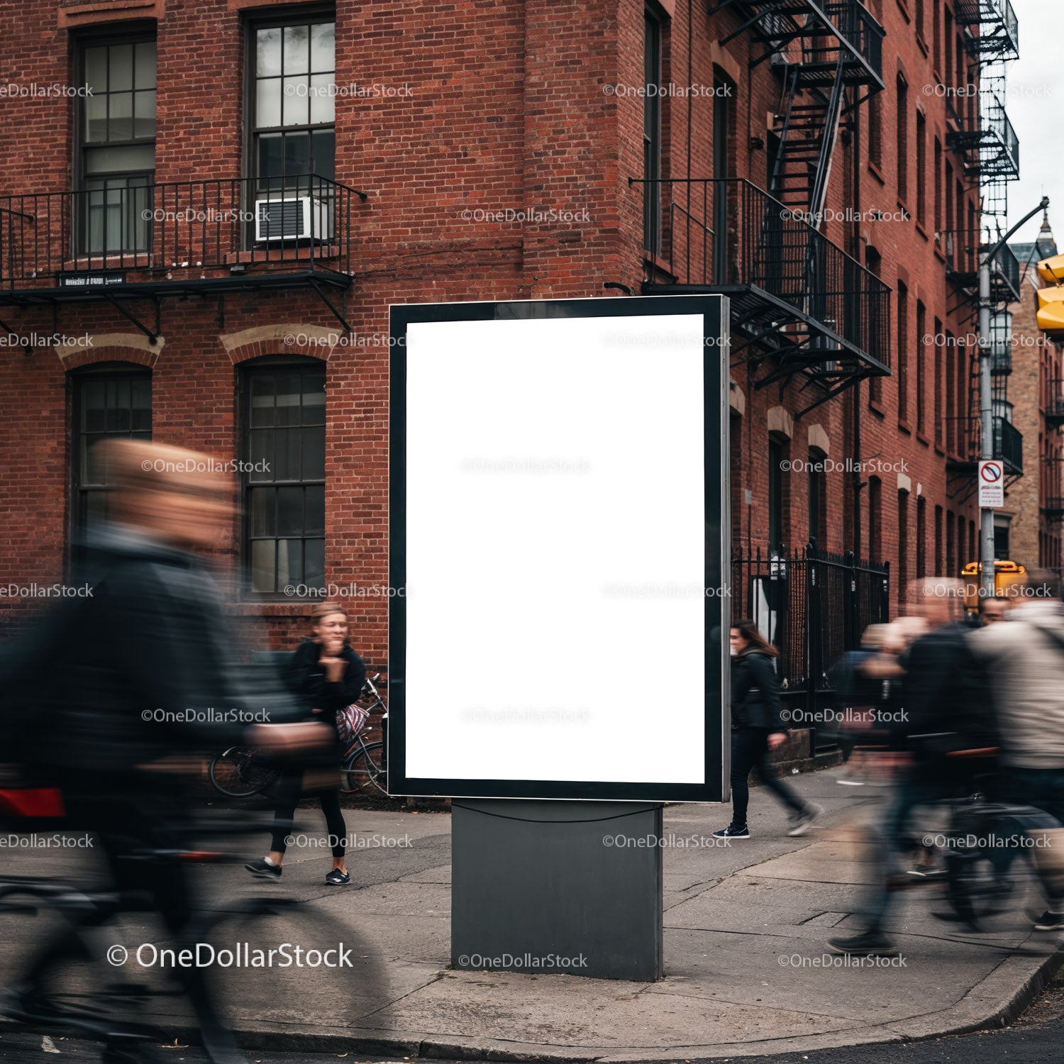 Blank urban billboard on busy city street corner