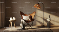 Cozy corner with leather butterfly chair and soft lighting