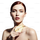 Elegant Woman with Red Hair and Fresh Pear on White Background