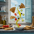 Mediterranean salad ingredients floating with olive oil splash