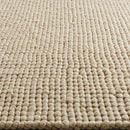 Close-up of Beige Woven Rug with Textured Pattern for Modern Interior Decor