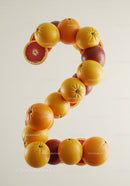 Number Two Made of Fresh Citrus Fruits on White