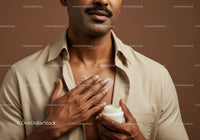 Close Up of Man Applying Moisturizer for Skin Care Routine
