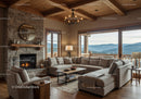 Cozy living room with stone fireplace and mountain views