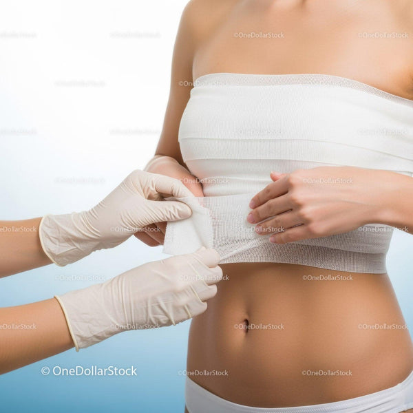 Medical Professionals Conducting Abdominal Ultrasound Examination