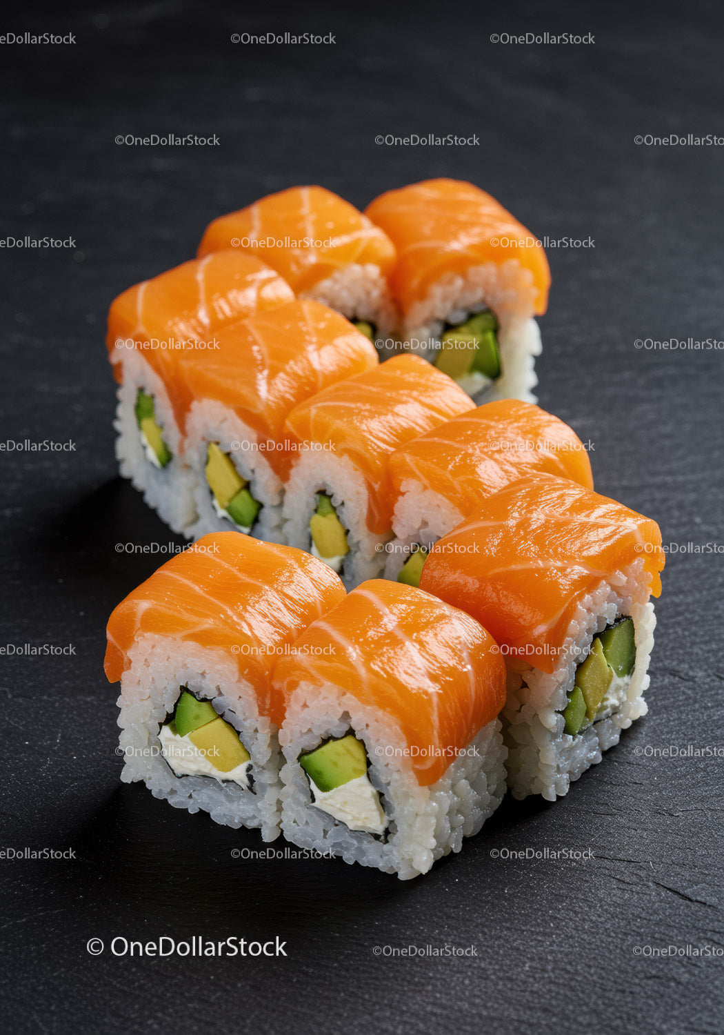 Fresh salmon sushi rolls with avocado and cream cheese