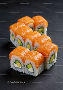 Fresh salmon sushi rolls with avocado and cream cheese
